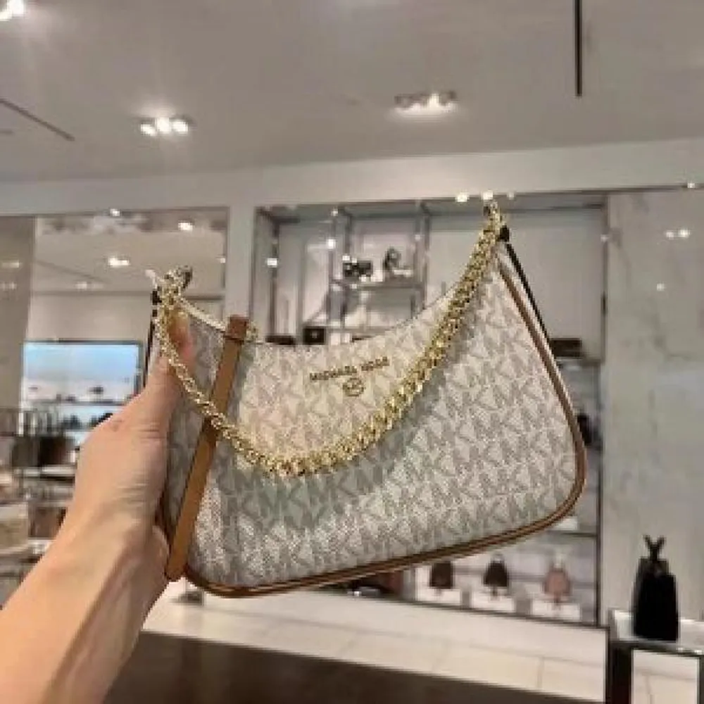 89 Michael Kors Small Pochhette Bag